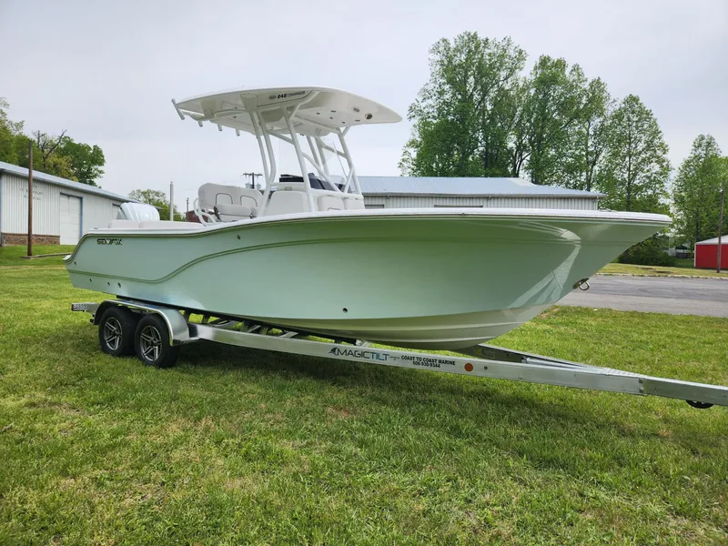 Slide: The Image of 2023 Sea Fox 248 Commander boat on trailer outdoors. - 2
