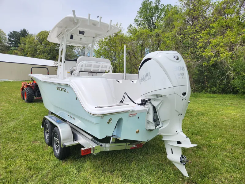 Slide: The Image of 2023 Sea Fox 248 Commander boat on trailer outdoors. - 3