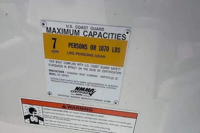 Slide: The Image of 2011 Stingray 185 LS/LX capacity label: 7 persons or 1070 lbs, U.S. Coast Guard compliant. - 17