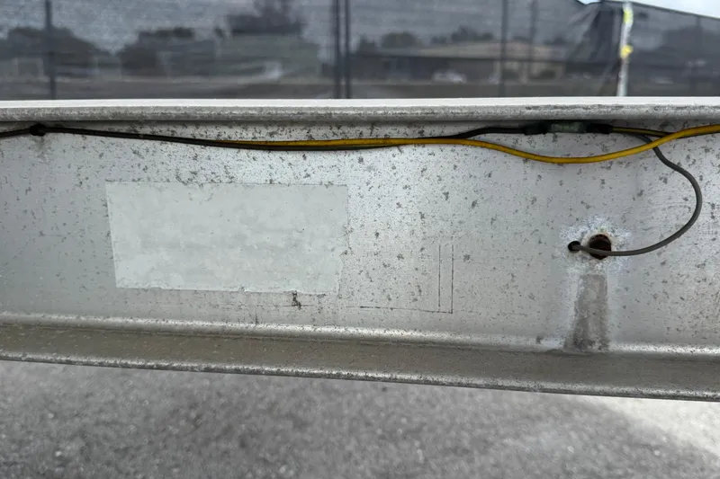 Slide: The Image of Close-up of wiring inside a 2006 Chaparral Sunesta 236 boat trailer. - 106