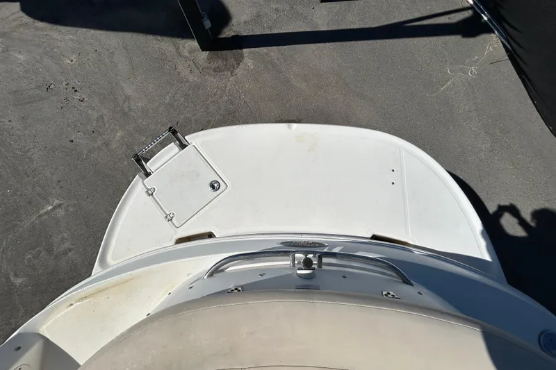 Slide: The Image of 2006 Chaparral Sunesta 236 boat swim platform with ladder, viewed from above. - 21