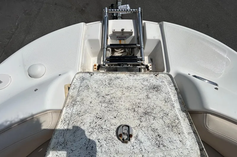 Slide: The Image of 2006 Chaparral Sunesta 236 boat deck with ladder and textured surface. - 81