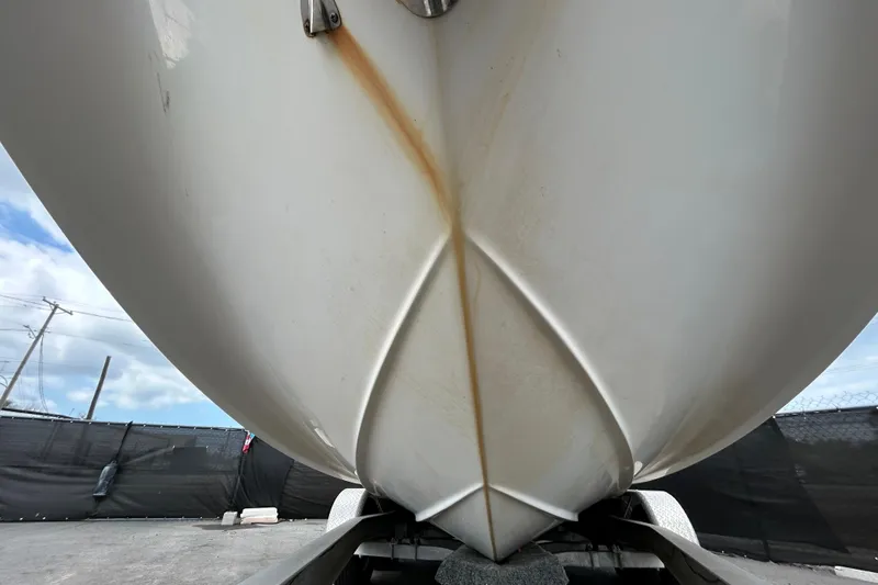 Slide: The Image of 2006 Chaparral Sunesta 236 boat hull on trailer, showing underside details. - 87