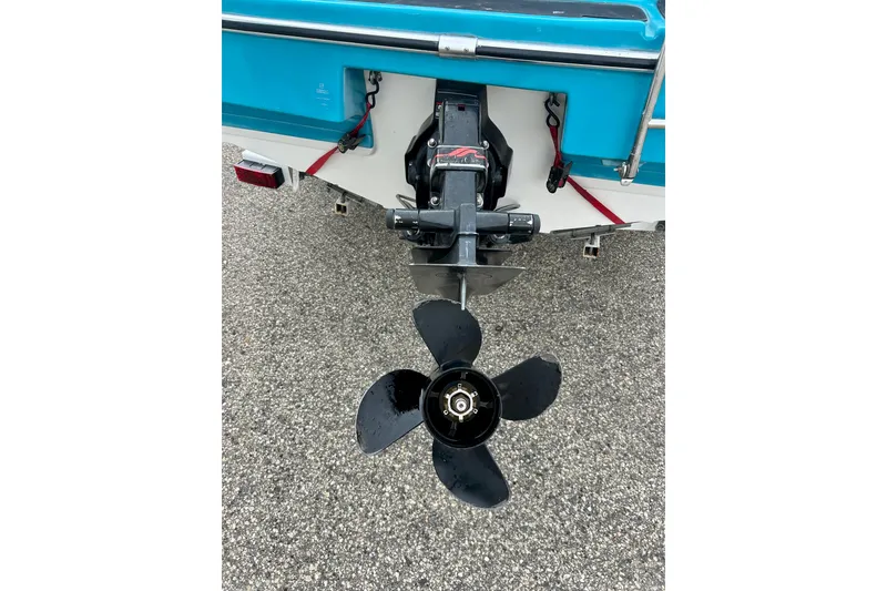 Slide: The Image of 1993 Glastron SSV 175 boat with visible propeller and outboard motor. - 4