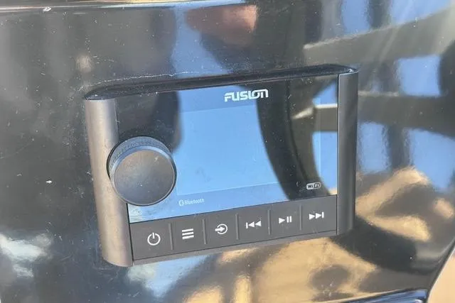 Slide: The Image of 2024 Sea Ray SPX 210 boat audio system with Fusion Bluetooth controls. - 18