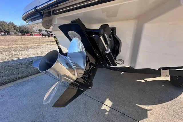 Slide: The Image of 2024 Sea Ray SPX 210 boat propeller and stern view on a sunny day. - 6