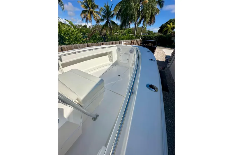 Slide: The Image of 2001 Contender 23 Open boat interior with steering console and seating. - 29