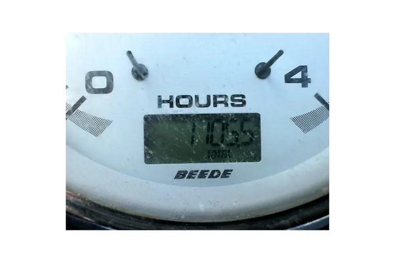 Slide: The Image of Hour meter reading 1055 on 2007 Back Cove 29 boat. - 4