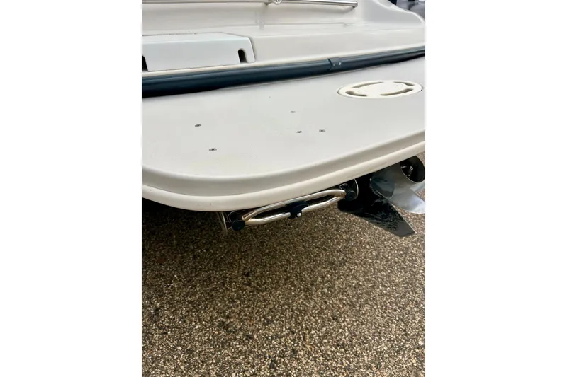 Slide: The Image of 1995 Crownline 202 BR boat stern with swim platform and propeller detail. - 17