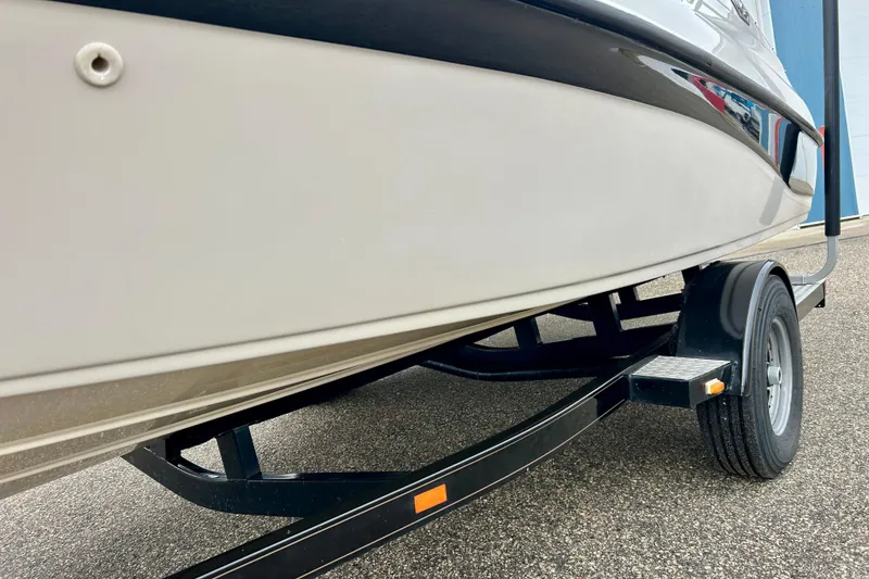 Slide: The Image of 1995 Crownline 202 BR boat on trailer, side view, close-up. - 24