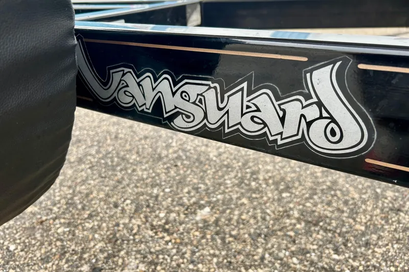 Slide: The Image of Vanguard logo on a 1995 Crownline 202 BR boat trailer frame. - 26