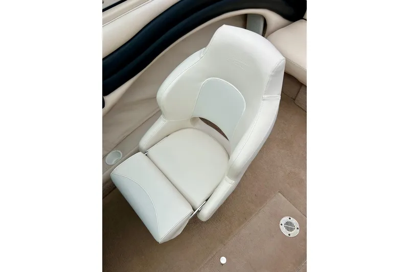 Slide: The Image of White leather seat in 1995 Crownline 202 BR boat interior. - 32