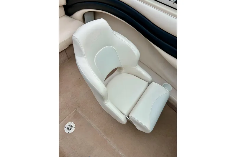 Slide: The Image of White leather seat in 1995 Crownline 202 BR boat interior. - 33