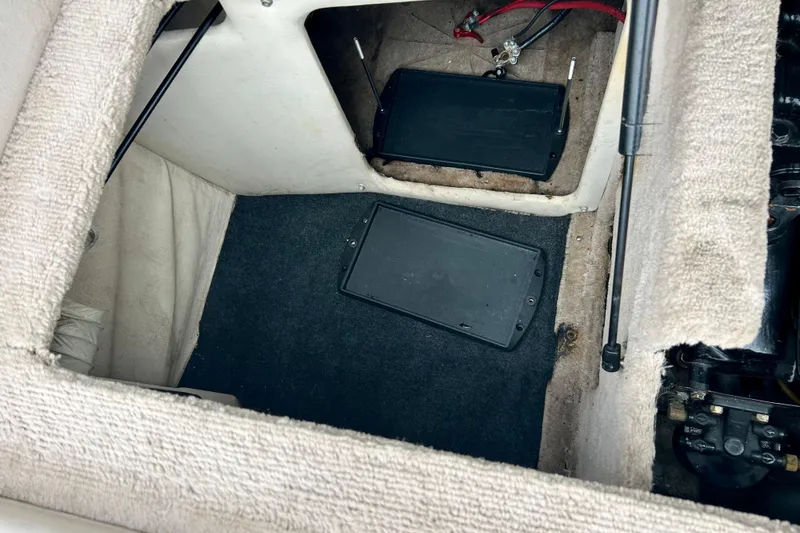 Slide: The Image of 1995 Crownline 202 BR boat interior showing battery compartment and wiring. - 41