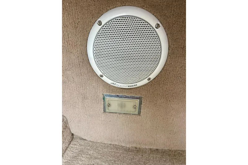 Slide: The Image of Speaker and light fixture in 1995 Crownline 202 BR boat interior. - 51