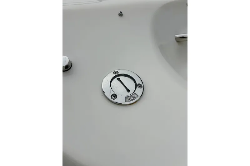 Slide: The Image of Fuel cap on 1995 Crownline 202 BR boat deck. - 58