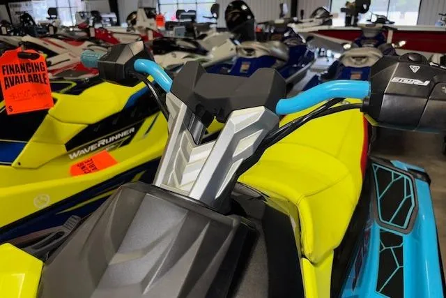 Slide: The Image of 2022 Yamaha WaveRunner JetBlaster in showroom, vibrant colors, financing available. - 17