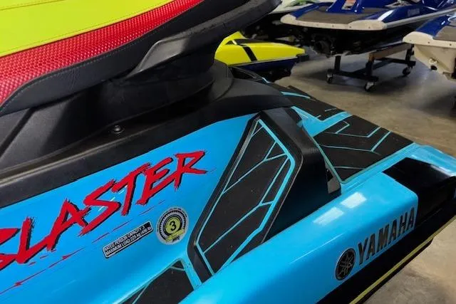 Slide: The Image of 2022 Yamaha WaveRunner JetBlaster in vibrant blue and red, showcasing sleek design details. - 4