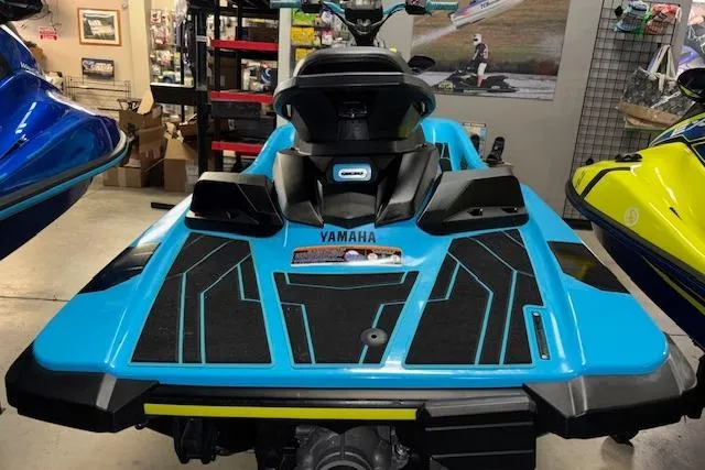 Slide: The Image of 2022 Yamaha WaveRunner JetBlaster in showroom, showcasing vibrant blue design and sleek features. - 5