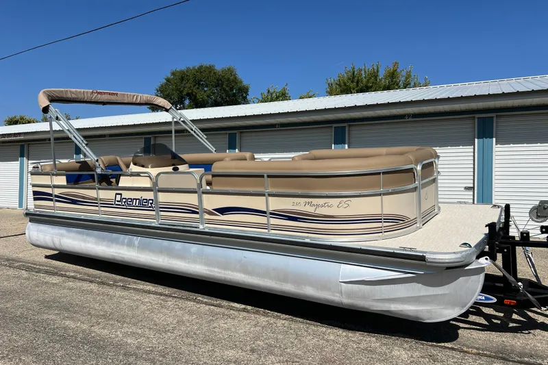 The Image of 2001 Premier 250 Grand Majestic pontoon boat parked outdoors. - 0