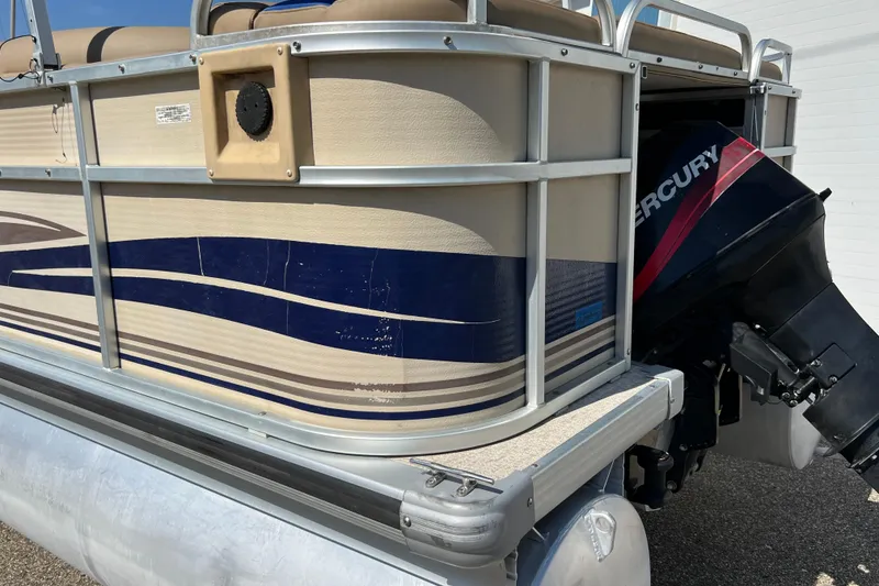 Slide: The Image of 2001 Premier 250 Grand Majestic pontoon boat with Mercury outboard motor. - 23