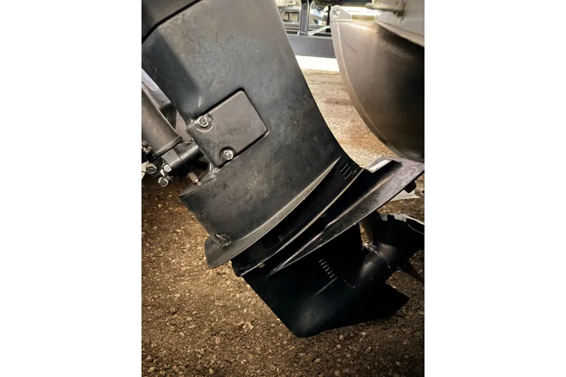 Slide: The Image of Black outboard motor with red accents, Premier 250 Grand Majestic, 2001 model. - 31