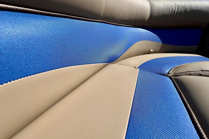 Slide: The Image of Blue and beige interior seating of 2001 Premier 250 Grand Majestic boat. - 5