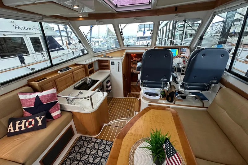 Slide: The Image of Aerial view of 2010 Back Cove 37 yacht cruising on blue ocean waters. - 18