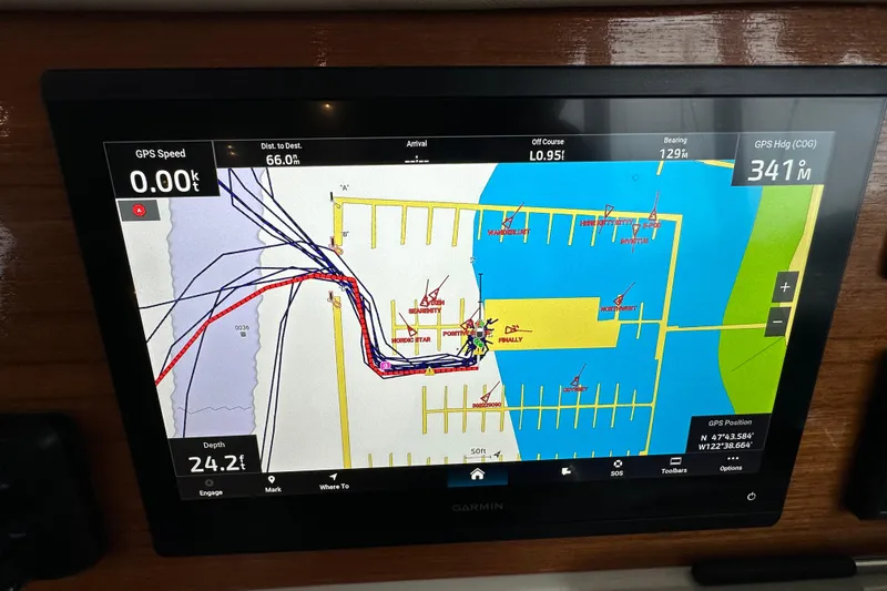 Slide: The Image of 2010 Back Cove 37 yacht cruising on calm waters at sunset. - 23