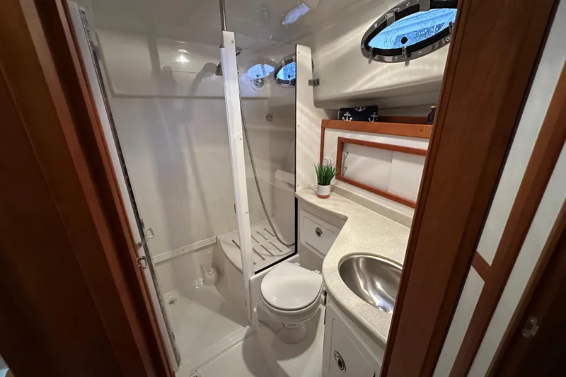 Slide: The Image of Luxurious 2010 Back Cove 37 yacht interior with modern kitchen and seating area. - 35