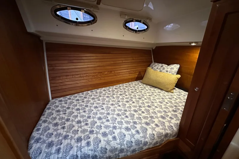 Slide: The Image of Garmin navigation displays on 2010 Back Cove 37 boat dashboard, showing GPS and speed data. - 38