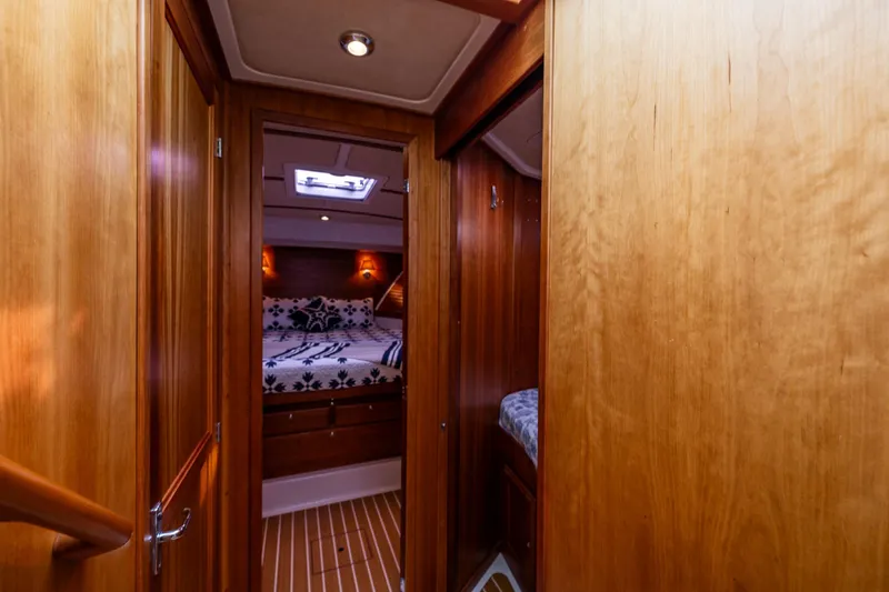 Slide: The Image of Luxurious cabin interior of 2010 Back Cove 37 yacht with wooden finish. - 49