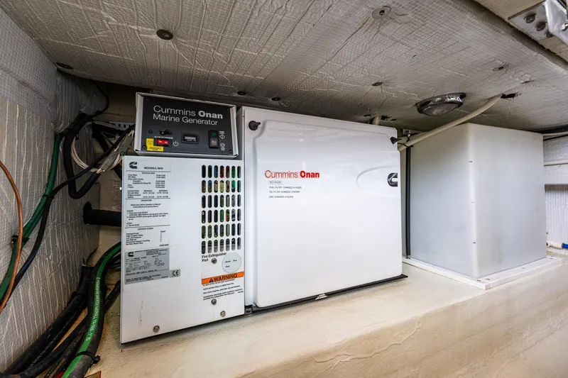Slide: The Image of Cummins Onan marine generator in 2010 Back Cove 37 boat engine room. - 62