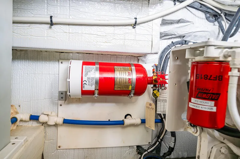 Slide: The Image of Engine room of 2010 Back Cove 37 with fire extinguisher and filter system. - 63