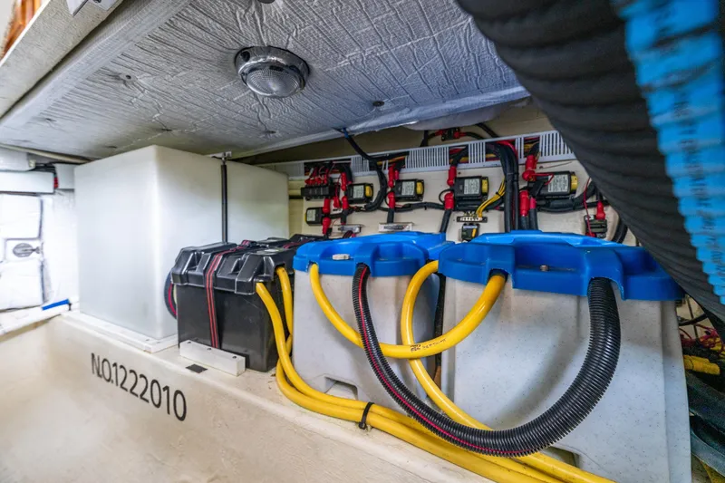 Slide: The Image of Electrical system of a 2010 Back Cove 37 boat, featuring batteries and wiring. - 66