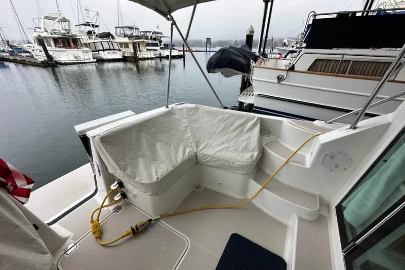 Slide: The Image of 2010 Back Cove 37 yacht cruising on open water. - 8