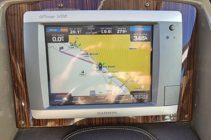 Slide: The Image of Garmin GPS display on 2012 Cruisers Yachts 350 Express, showing navigation map and coordinates. - 10