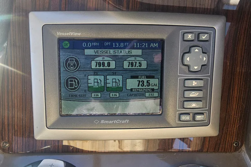 Slide: The Image of SmartCraft VesselView display on 2012 Cruisers Yachts 350 Express showing vessel status and fuel levels. - 11