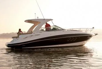 Slide: The Image of Manufacturer Provided Image: 2012 Cruisers Yachts 350 Express on calm water at sunset. - 2