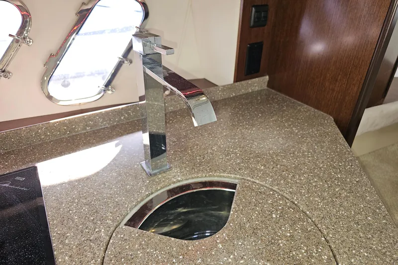 Slide: The Image of Luxury yacht kitchen sink with modern faucet, 2012 Cruisers Yachts 350 Express. - 28