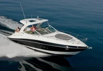 Slide: The Image of Manufacturer Provided Image: 2012 Cruisers Yachts 350 Express cruising on open water. - 4