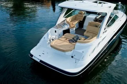 Slide: The Image of Manufacturer Provided Image: 2012 Cruisers Yachts 350 Express luxury boat on calm water. - 5