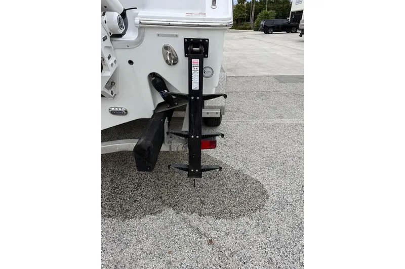 Slide: The Image of Rear view of 2025 Sea Hunt Ultra 265 SE boat on a trailer. - 20