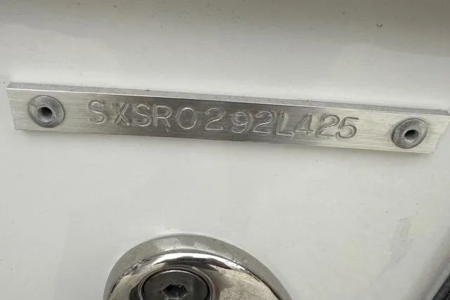 Slide: The Image of 2025 Sea Hunt Ultra 265 SE boat identification plate with serial number. - 8