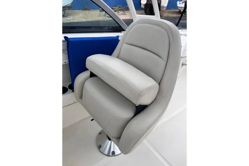 Slide: The Image of 2015 Boston Whaler 230 Vantage boat seat, gray upholstery, modern design. - 18