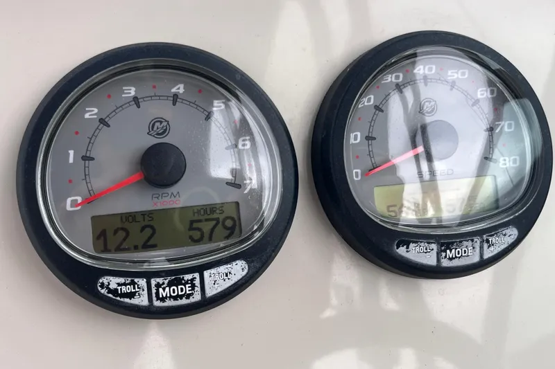 Slide: The Image of Close-up of 2015 Boston Whaler 230 Vantage boat gauges displaying RPM and speed. - 24
