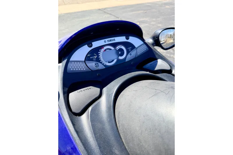Slide: The Image of 2004 Yamaha WaveRunner FX Cruiser dashboard with speedometer and controls. - 11