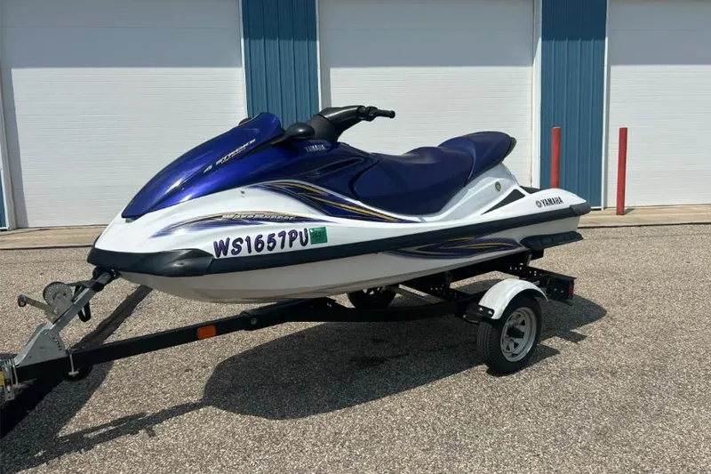 Slide: The Image of 2004 Yamaha FX 1000 jet ski on trailer, parked outdoors. - 7