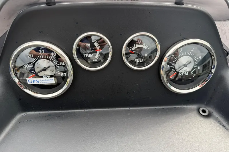 Slide: The Image of Dashboard of 2026 Lowe LS 190 boat with speedometer, trim, fuel, and RPM gauges. - 18