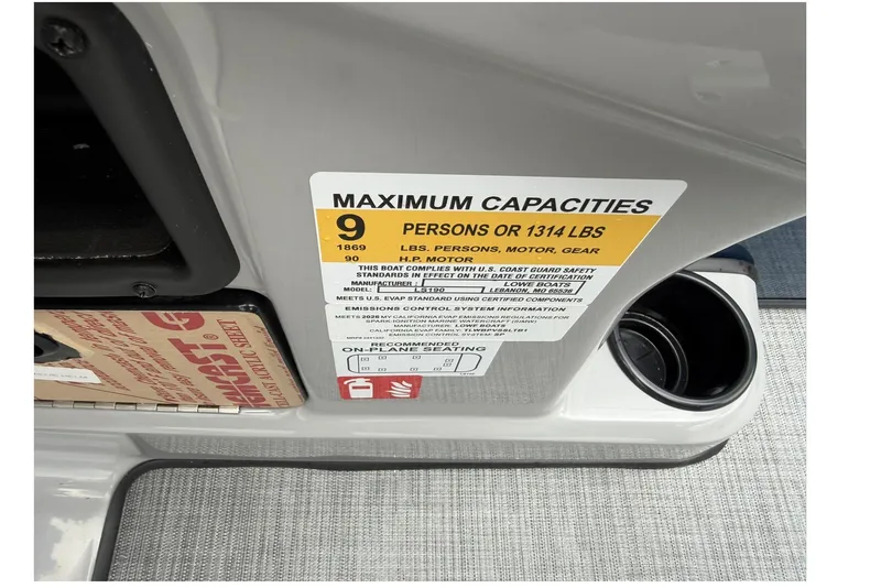 Slide: The Image of Maximum capacity label on 2026 Lowe LS 190 boat, indicating 9 persons or 1314 lbs. - 21